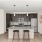 kitchen with an island and bar stools