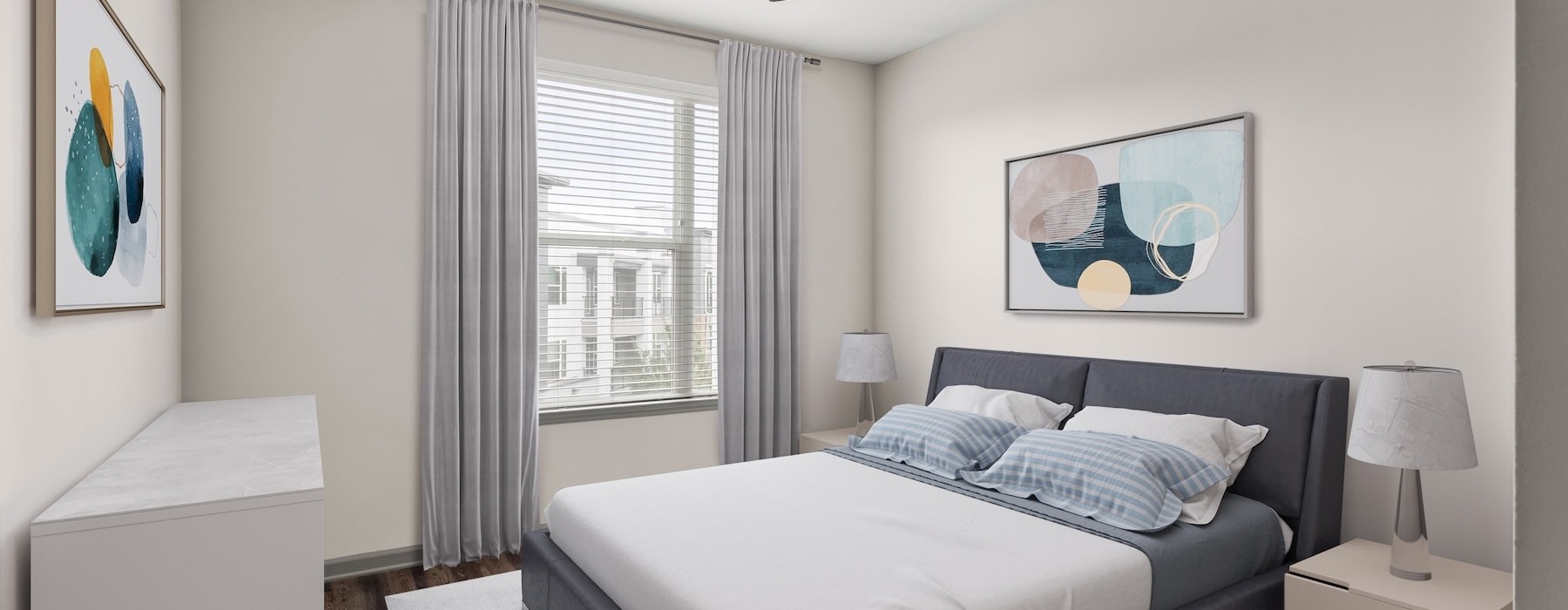 bedroom with a large window and ceiling fan above a bed